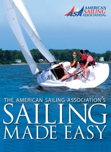 A sailboat with two people on board navigating on a body of water, with trees in the background and text overlay reading "The American Sailing Association's Sailing Made Easy."